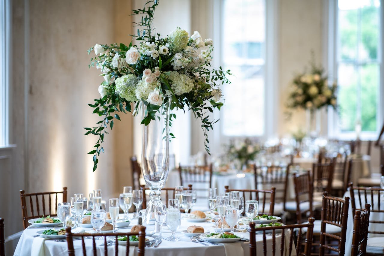 Beautifully decorated wedding reception table with floral centerpiece and fine dining setup in Lancaster, PA.
